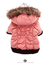 Luxury Pink Quilted Ski Parka - This gorgeous dusky pink quilted ski parka designed to hold the heat. The arms and hem are elasticated to ensure the best possible fit. The hood is finished with luxurious faux fur and the soft pink fleece lining will keep your dog cosy and warm. The coat fastens along the underside with Velcro maki...